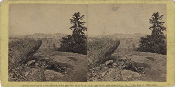 Stereograph of Signal Rock (signal station) on top of Little Round Top at the site of the Gettysburg battlefield. This shows the center of the Federal position. Handwritten on back "Signal Rock."