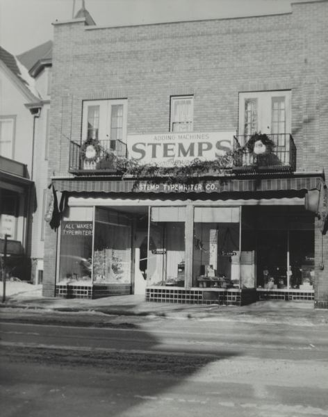 View across State treet of the Stemp Typewriter Company storefront. This was the new location, now owned by the Stemp family.