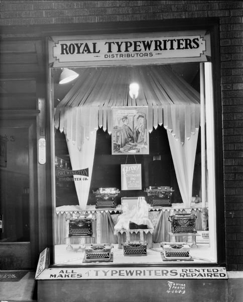 Brewington Typewriter Company, 533 State Street, window display featuring Royal Typewriters. The name was later changed to Stemp Typewriter Company.
