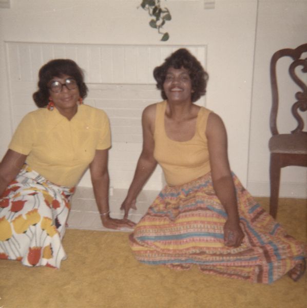 Portrait of Mrs. Gertrude Wall of Columbia, Ohio, who was the cousin of Vel Phillips. Seated next to her is a woman identified as Liee Williams. The back of the photograph includes the inscription "To my friend, Liee."