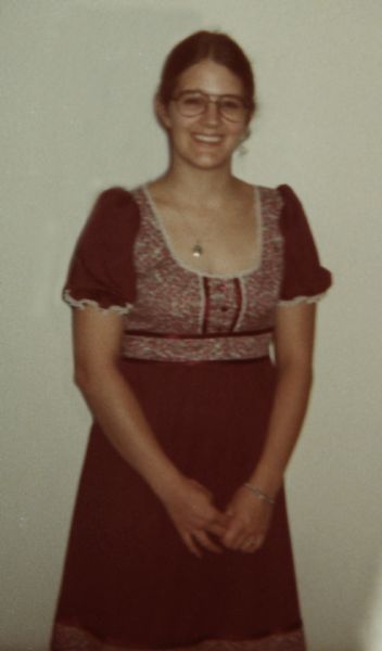 Bride-to-be posing in the dress she wore to her wedding rehearsal and dinner.
The dress is in the collections of the Wisconsin Historical Museum (2012.182.16).