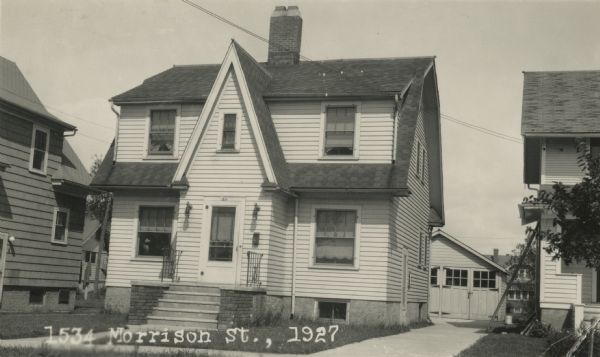 Photographic postcard view from street of the house at 1534 Morrison Street. The home was built by Willard Droster. Caption reads: "1534 Morrison St., 1927."