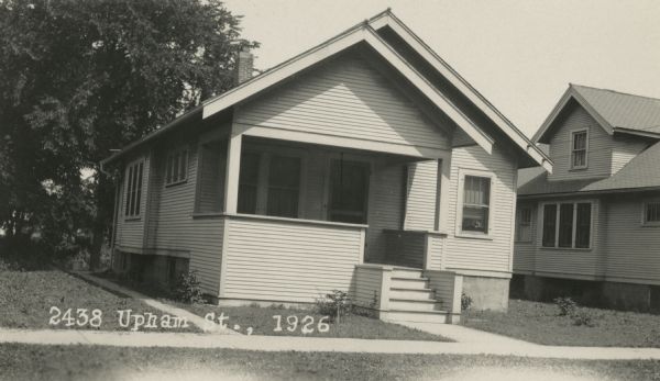 Photographic postcard view from street of the house at 2438 Upham Street, built by Willard Droster. Caption reads: "2438 Upham St., 1926."