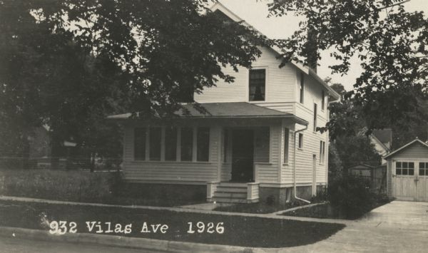 Photographic postcard view from street of the house at 926 Vilas Avenue. The residence was built by Willard Droster. Caption reads: "932 Vilas Ave. 1926."
