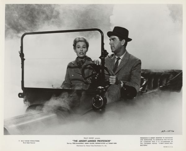 Still photograph of Nancy Allen and Fred MacMurray riding through the clouds in his Flubber powered Model T.