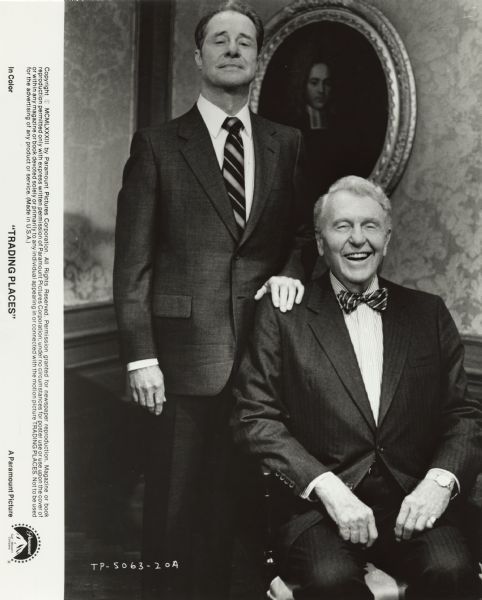 Don Ameche (standing) and Ralph Bellamy (sitting) pose as the Duke Brothers from the film <i>Trading Places</i>.