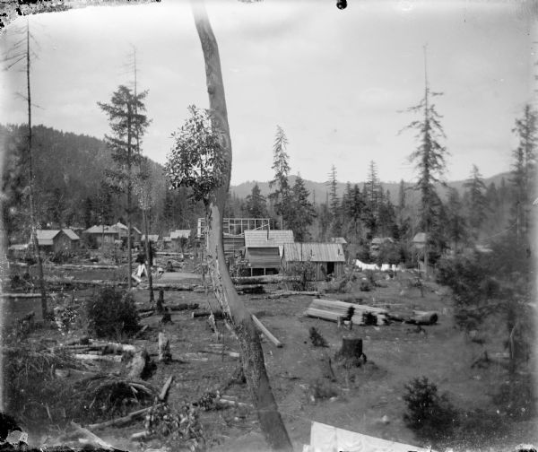 Elevated view of a mining camp in the western United States. At this time Carl Peterson was writing letters home to Christine Jenson about his journey.