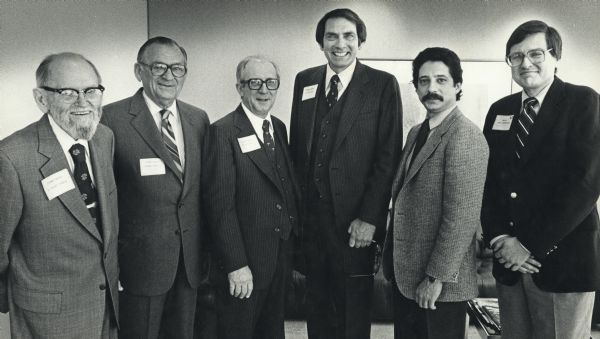 Paul Soglin posing with a group of five former mayors. Left to right: Former Mayor F. Halsey Kraege, 1943-1947, Former Mayor George Forster, 1950-1955, Former Mayor Otto Feske, 1965-1969, Former Mayor William Dyke, 1969-1973, Mayor Paul Soglin, 1973-1979, 1989-1997, 2011-present, Joel Skornicka, 1979-1983. Paul Soglin defeated William Dyke in 1973 and became Mayor of Madison at age 27.