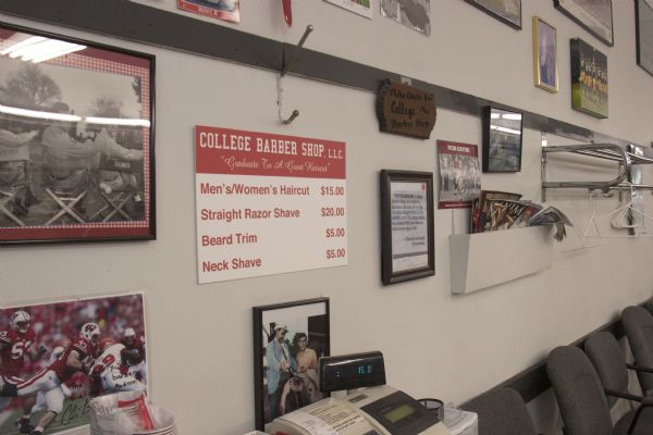 The last week of business at the College Barber Shop. Interior details include prices for haircuts, shaves, and trims.