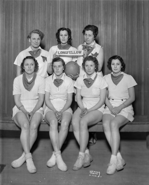 Group portrait of the City of Madison recreational volleyball champions. Longfellow School was located in the Greenbush neighborhood. Front left is Agnes Balk, right back is Frances Balk.