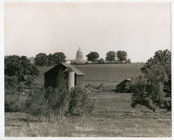 The Schuepbach Farm off East Clayton Road, with a view of the Wisconsin State Capitol in the far distance.