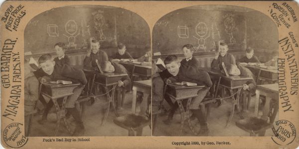 Stereograph of mischievous schoolboys in a classroom. One boy is reacting to something sharp on his desk chair and two boys are enjoying the results of the prank. Caption reads: "Peck's Bad Boy in School." Text on left side of card reads: "Geo. Parker, Niagara Falls, N.Y.," "Eleven First Prize Medals," and "Grand Prize Diamond Badge 1887." Text on the right side reads: "American Foreign Genre & Comic," "Gems of Instantaneous Photography" and "Gold Medal Paris 1889."
