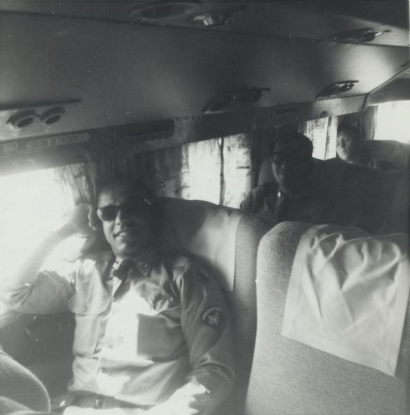 Lewis Arms is sitting on an airplane as he and other soldiers travel to Fort Knox.