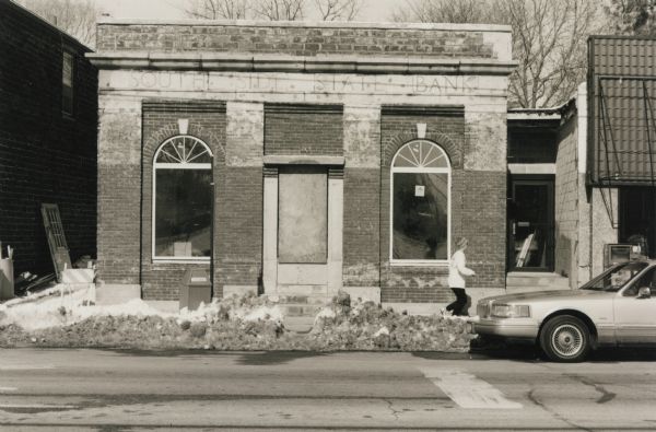The former South Side State Bank building at 330 West Lakeside Street during renovation. The bank opened in 1920 and closed between 1933 and 1937. Some of the occupants through the years have been Bob White Candy Company (1939-1967), Nutzy Mutts and Crazy Cats, Bang Salon, Out-U-Go, a bait shop and a bakery under three different owners. The building was purchased in April 1997 and then renovated by Michael Ulrich.