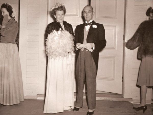 Harry Lynde Bradley, and his wife Margaret "Peg" Blankney Sullivan Bradley, standing together and posing in evening wear at an event.