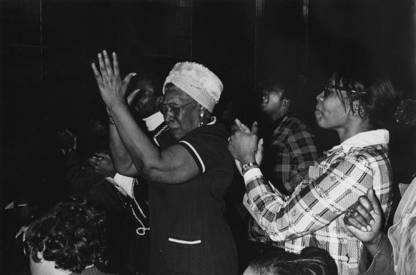 Audience at a PUSH (People United to Serve Humanity) Rally responding to the Reverend Jesse Jackson. 