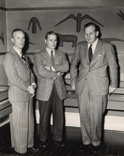 Group portrait of, from left to right: Professor Howells, John W. Jenkins (chief curator of the Wisconsin Historical Museum), and Professor Dave Baerreis. 