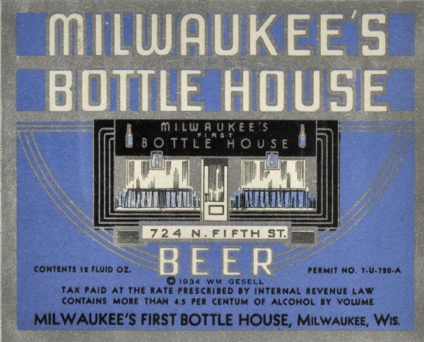 Label submitted to the state of Wisconsin for trademark registration. Blue, black and silver art deco-style beer label for Milwaukee's First Bottle House beer. The image on the label includes drawings of four beer bottles displayed on a storefront, and lists the address of the company as 724 N. Fifth St.