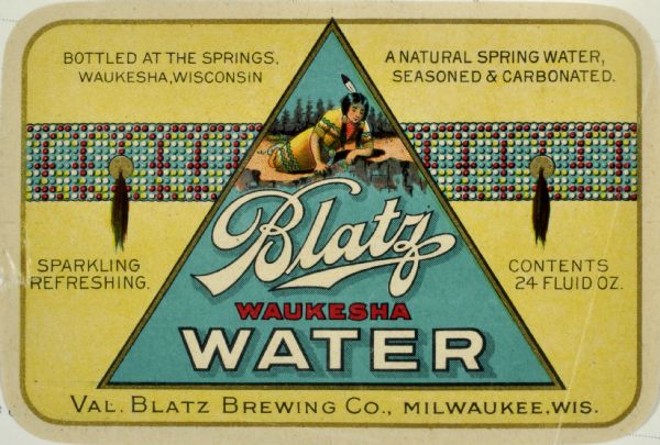 Label submitted to the state of Wisconsin for trademark registration. "Blatz Waukesha Water, Bottled at the Springs, Waukesha WI, A natural spring water, seasoned & carbonated, Sparkling refreshing. Val. Blatz Brewing Company." The label features an image of a Native American woman reclining on the shores of a lake. This was one of the products produced by the company during prohibition.
