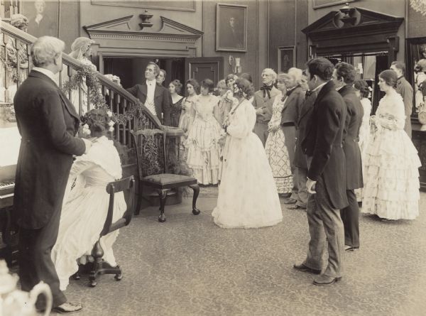 Film still of a wedding.

	