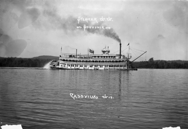 View across water of an excursion steamboat on the Mississippi River. This image is a part of Frank Feiker's 'Souvenir' series.