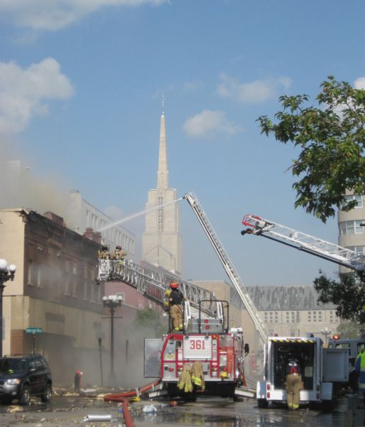 Firefighters respond to a fire at the Democratic Party Office at 118 Fifth Avenue. Viewed from Fourth Street intersection.