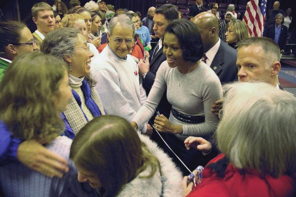 Michelle Obama greets supporters at a presidential campaign rally for her husband at University of Wisconsin-La Crosse.