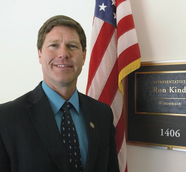 Wisconsin Congressman Ron Kind standing at the entrance of his Washington office.