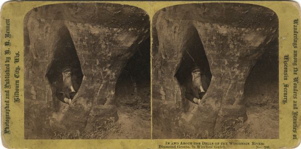 Stereograph of a bearded man, William Metcalf, at Diamond Grotto in Witches' Gulch. Text at right: "Wanderings Among the Wonders and Beauties of Wisconsin Scenery."