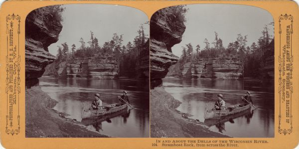 Two men canoeing at Steamboat Rock. Text at right: "Wanderings Among the Wonders and Beauties of Wisconsin Scenery."