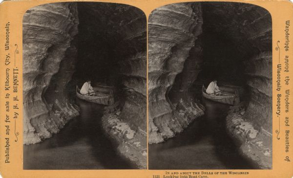 Stereograph of a cave, where a man is sitting in a canoe. Text at right: "Wanderings Among the Wonders and Beauties of Wisconsin Scenery."