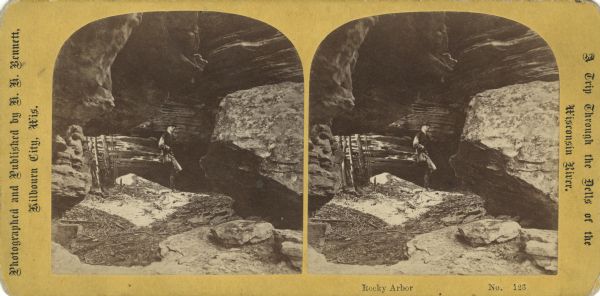 A man at the bottom of a canyon at Rocky Arbor park. Text at left: "A Trip Through the Dells of the Wisconsin."