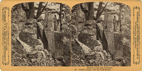 A man wearing a hat and suit is standing on Titan's Chair. Text at right: "Wanderings Among the Wonders and Beauties of Wisconsin Scenery."