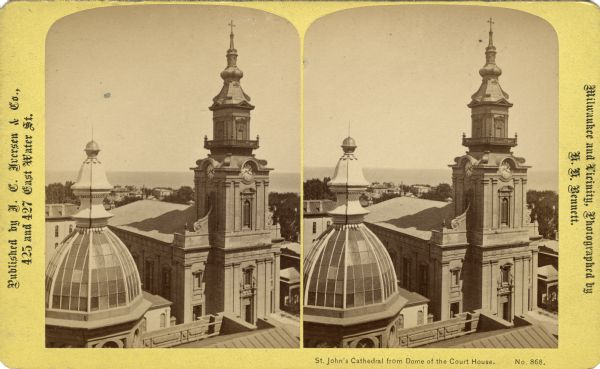 Stereograph elevated view of Saint John's Cathedral, on 812 North Jackson Street, from the Courthouse. Lake Michigan is in the background.