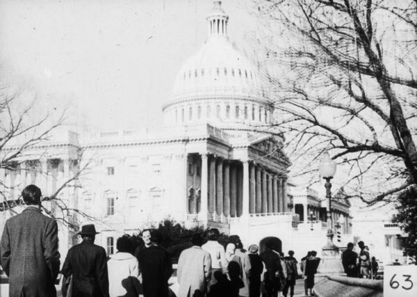 A group of people approach the US Capitol on Congress' opening day.  This is part of the Mississippi Freedom Democratic Party (MFDP) challenge that the November 3rd election results do not represent Mississippi.