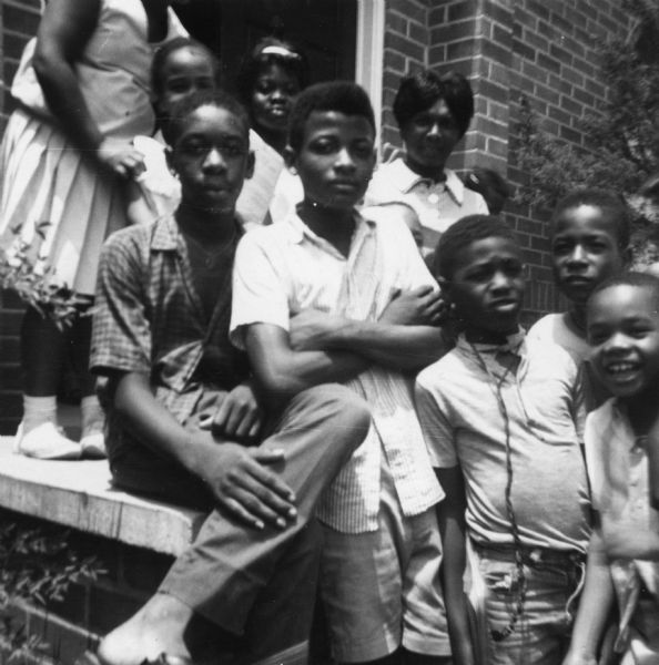 A group of children in an image taken by a civil rights volunteer.

"My Freedom School friends and students.  Left to right: Cleophus (call me Cleo) Brown, R.C. Butler, and George.  We not only talked about freedom, but also took part in freedom actions."