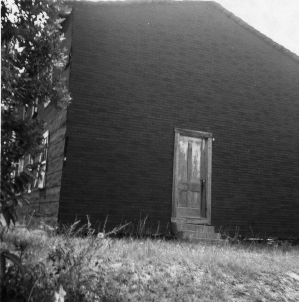 Lodge Hall on Highway 98, photographed by a civil rights volunteer.<p>"Front view of the Lodge Hall (Summit), site of two successful freedom meetings. Prior to our canvassing efforts, the Negro people of Summit had never met as a group to discuss their common problems. Before she would attend, one woman wanted to be certain that no violence would take place."