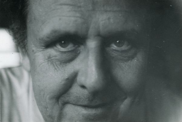 Close-up portrait of De Antonio's face.