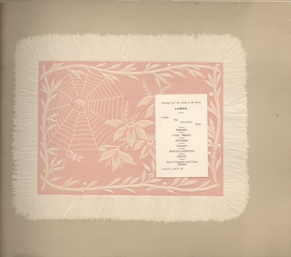 Lunch menu from the souvenir booklet of the Complimentary Excursion to General Passenger & Ticket Agents, with an embossed illustration of a spider in her web amidst a frame of leafy branches, flowers, and a flying insect. The small printed menu listing is tipped in on the page. The excursion was sponsored by the National Association of General Passenger & Ticket Agents for members traveling via train from Chicago, Illinois, to the semi-annual meeting in St. Paul, Minnesota.