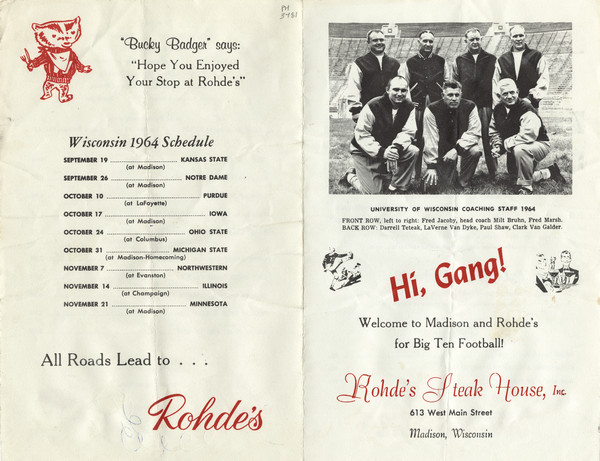 Exterior of the Rohde's Steak House special football luncheon menu, with a photograph of the University of Wisconsin coaching staff for the 1964 season (Fred Jacoby, Milt Bruhn, Fred Marsh, Darrell Teteak, LaVerne Van Dyke, Paul Shaw, and Clark Van Galder), spot illustrations of a football play and two waiters holding drinks, and Bucky Badger wearing a napkin bib and holding a knife and fork.