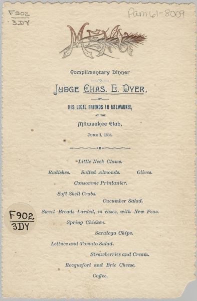 Card menu for a dinner for Judge Charles E. Dyer, given by his "legal friends in Milwaukee, at the Milwaukee Club." At the top is a stalk of wheat interlaced with the letters in "Menu," in embossed copper and silver metallic two-tone lettering.