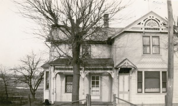This two-story, wood frame house with Eastlake detailing and front bay window was owned by Mrs. Carl Kreawaldt. The New Fane school teacher, Miss Marie E. Adams boarded here.