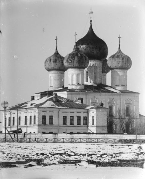 View from frozen river of a Russian Eastern Orthodox church with three onion domes.