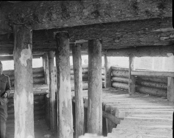 Interior of blockhouse No. 2 looking out, showing use of timbers to reinforce the fortification's construction. There is a partial image of a soldier standing on the left.