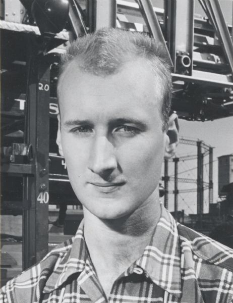 Portrait, close-up, of Neill Brey on the occasion of a fire in the toy factory where he was employed.