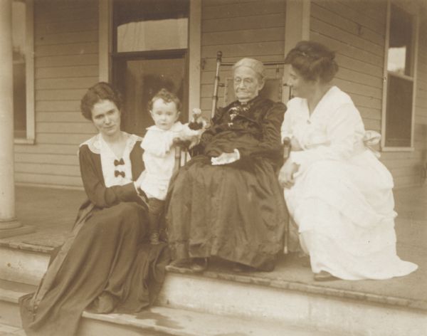 Four generations of members of the Glasier family on the porch.