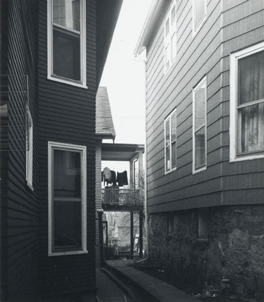 View between residential houses on South Henry Street.
