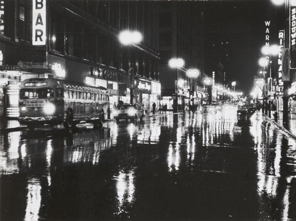 Downtown street on a rainy night.