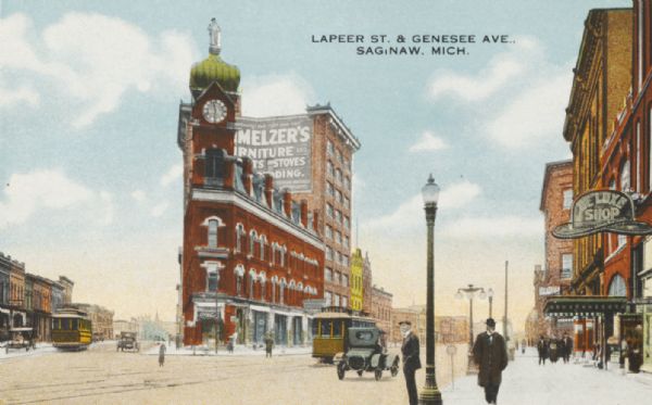 Color postcard depicting residents, automobiles and streetcars. Caption reads: "Lapeer St. & Genesee Ave. Saginaw, Mich."