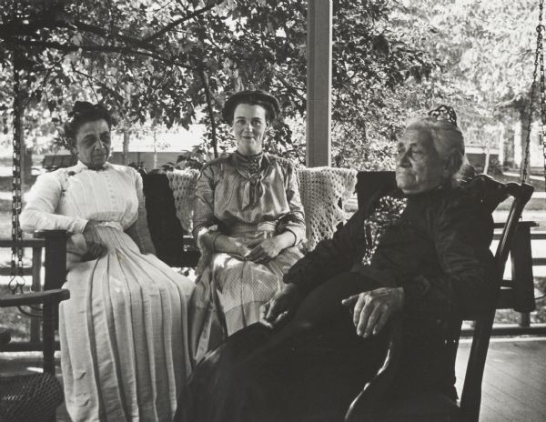 Members of the family of Dr. Joseph Smith, seated on the porch.